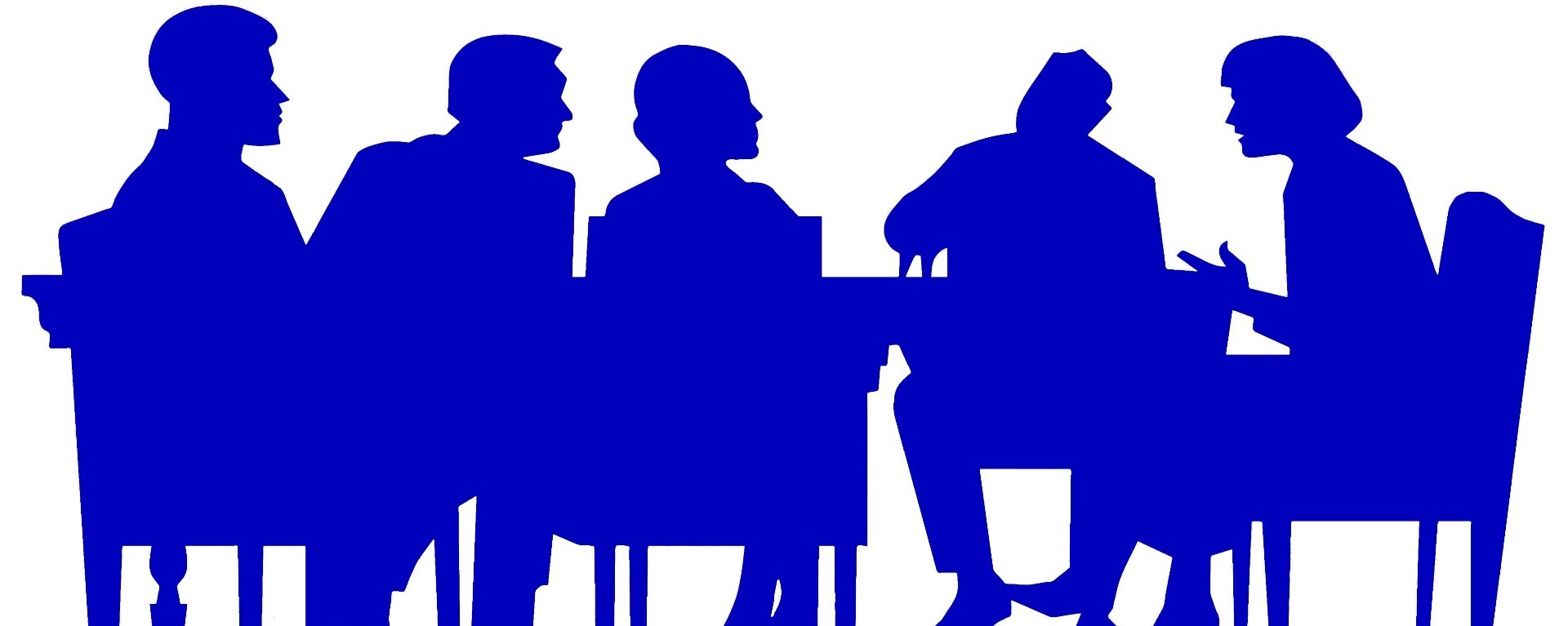 People sitting at a table at a meeting